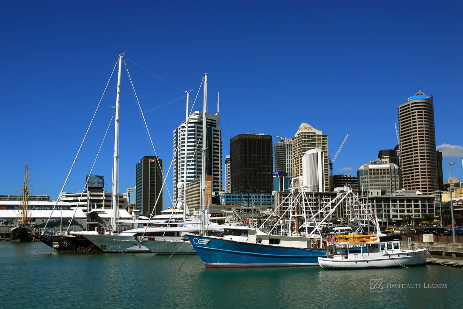 Hospitality News: Auckland city is New Zealand's largest and home to around one million people. Harbour and city skyline on 23 March 2007 in Auckland, New Zealand