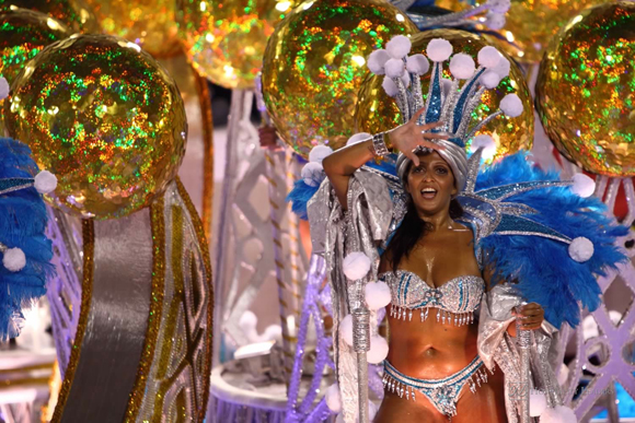 Samba dancer dressed up for the Rio Carnival in Sambadome February 22, 2009 in Rio de Janeiro, Brazil. The Rio Carnival is the biggest carnival in the world