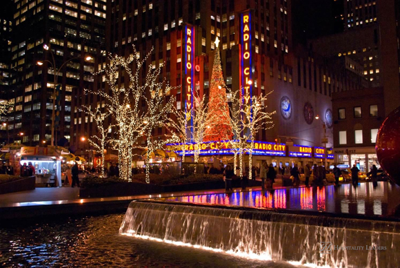 MANHATTAN - DECEMBER 7: Bright holiday lights are a big tourist attraction around Rockefeller Center on December 7, 2009 in New York City.