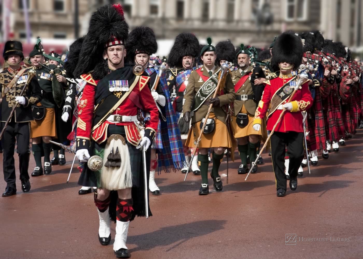 GLASGOW- AUGUST 9 : A Scottish Highland Military Tattoo Band performs at a festival on AUGUST 9, 2010 in Glasgow, Scotland