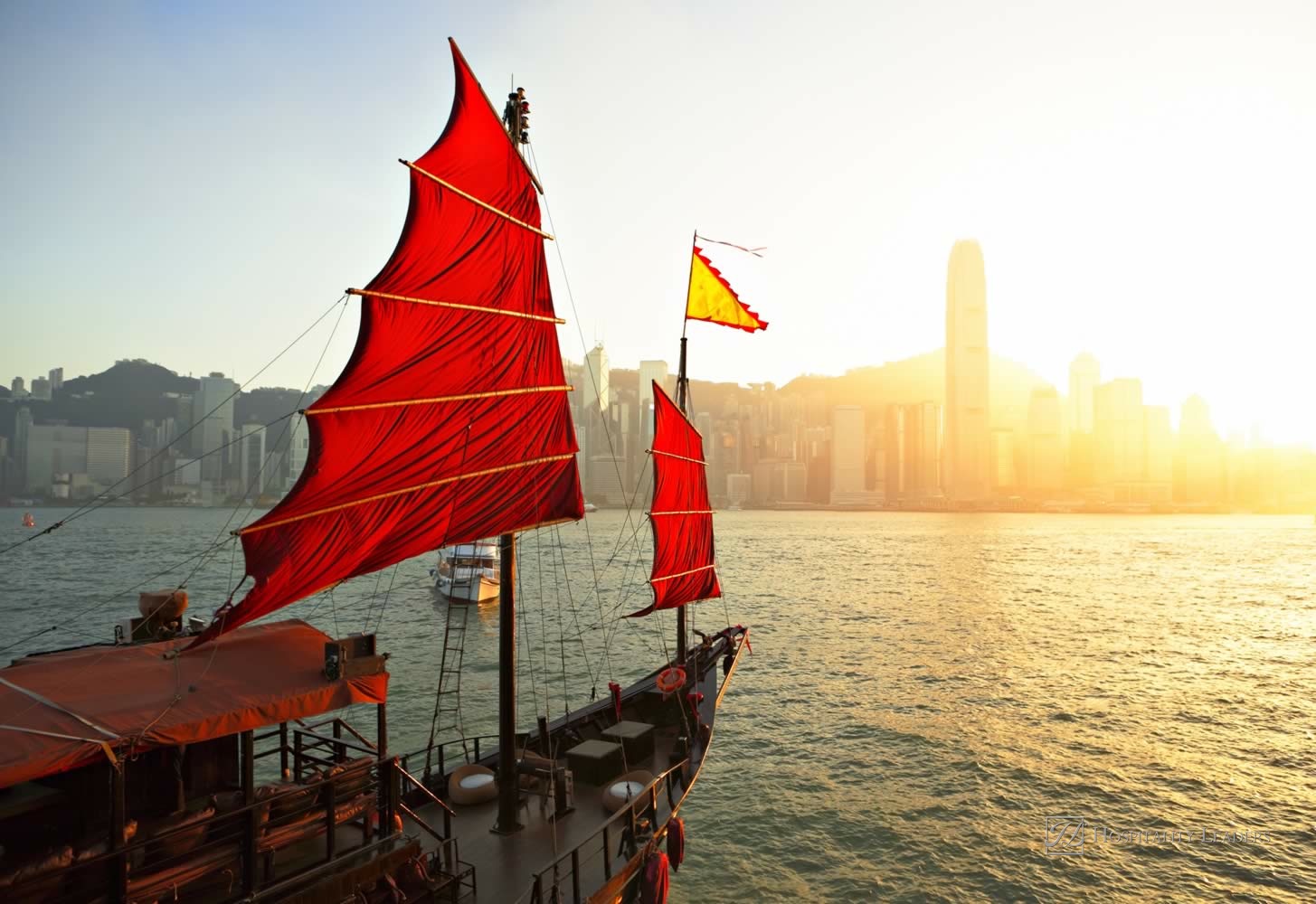 Hospitality News: Sailboat in Hong Kong harbor