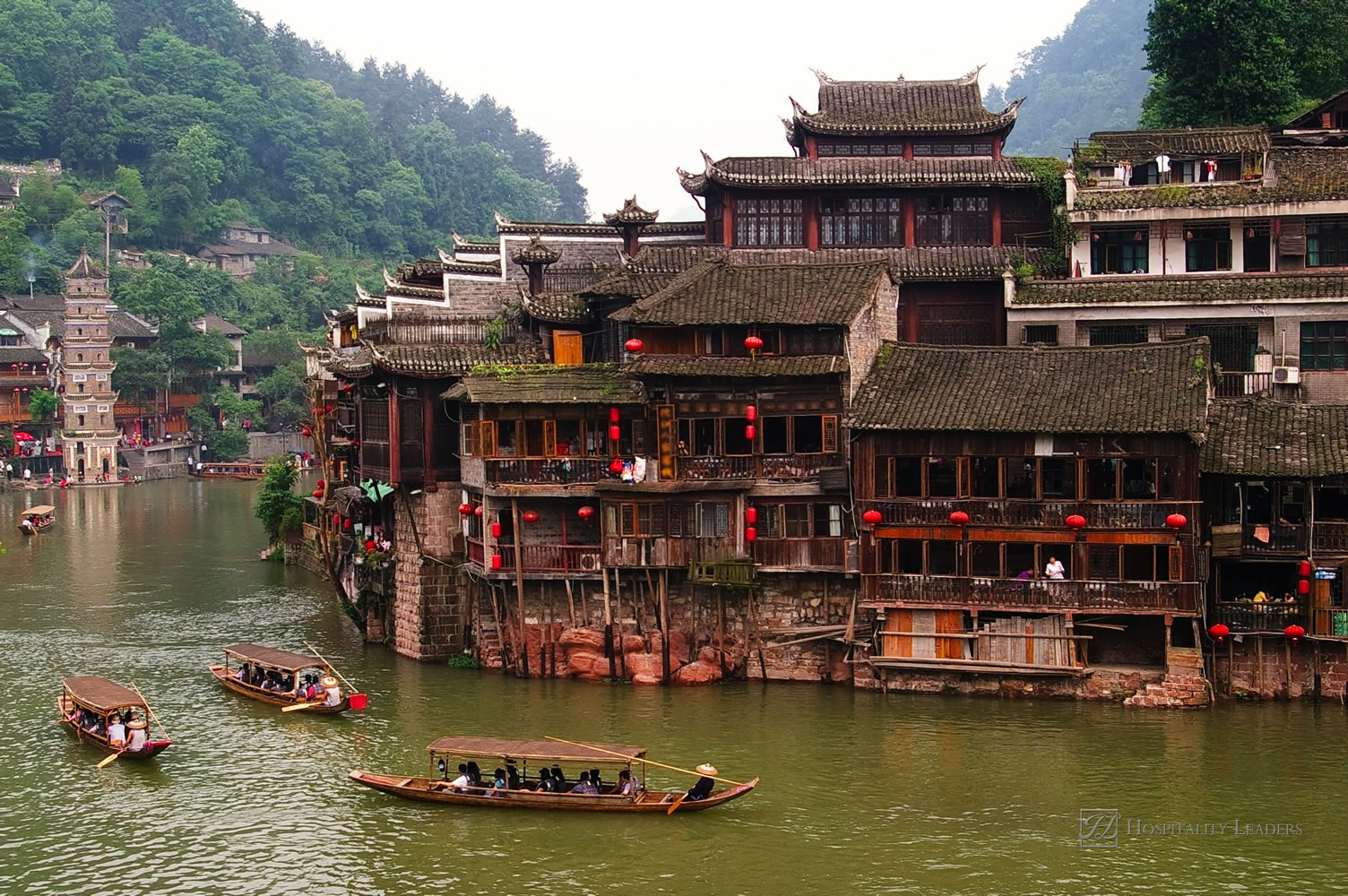 boats and wooden houses at Phoenix Town - the one the four most attractive small towns in China, next to Tuojiang