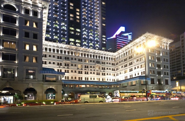 Kowloon, HongKong - January 9: Hong Kong famous luxury Hotel Peninsula by night on January 09,2010 Kowloon, Hongkong. Opened 1928 in colonial style