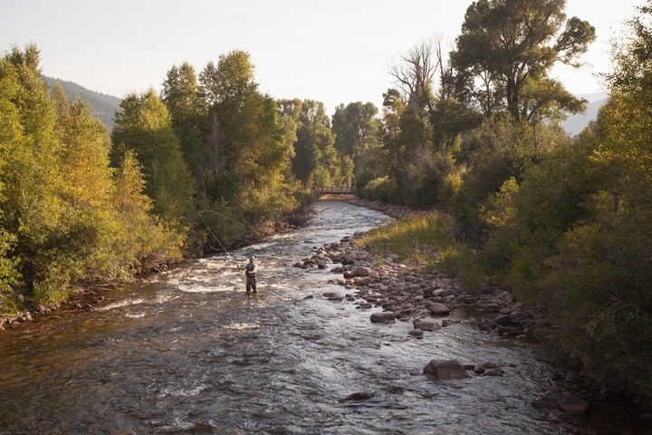 Fly Fishing at Alexander Creek, one of the many outdoor experiences at The Lodge at Blue Sky