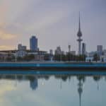 City skyline reflecting in harbour